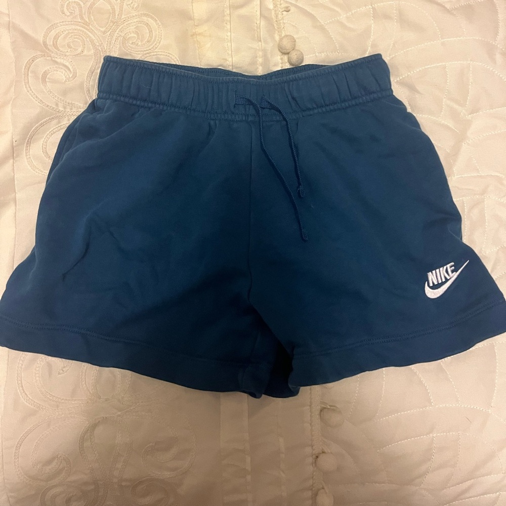 Nike women’s sportswear club fleece mid rise shorts dark blue